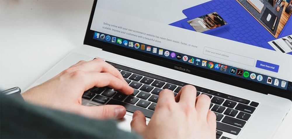 Male executive with hands only visible goes online via his laptop and discovers that just by keying in his IP address he has revealed a large amount of information about himself.